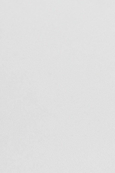 Okrągły stolik pomocniczy Ø50 cm z cementu Zenadia biały